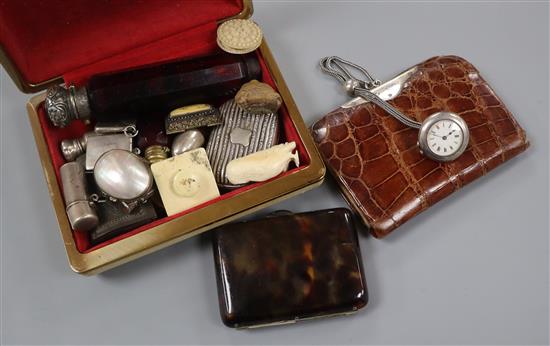 A group of scent bottles, other vertu, a tortoiseshell cased and a silver mounted crocodile purse and fob watch